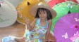 Girl with umbrellas
